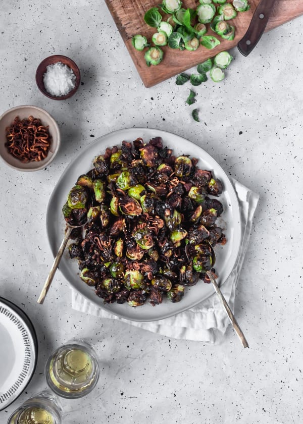 Crispy Brussels Sprouts With Fried Shallots, Bacon, & Dijon Vinaigrette cover