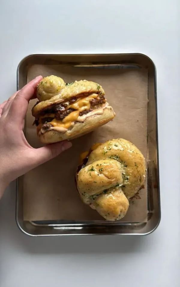 Garlic Knot Double Smash Burger with Caramelized Onion and Chipotle Sauce cover