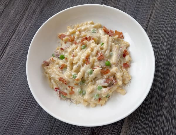 Creamy Gemelli Pasta with Peas & Prosciutto cover