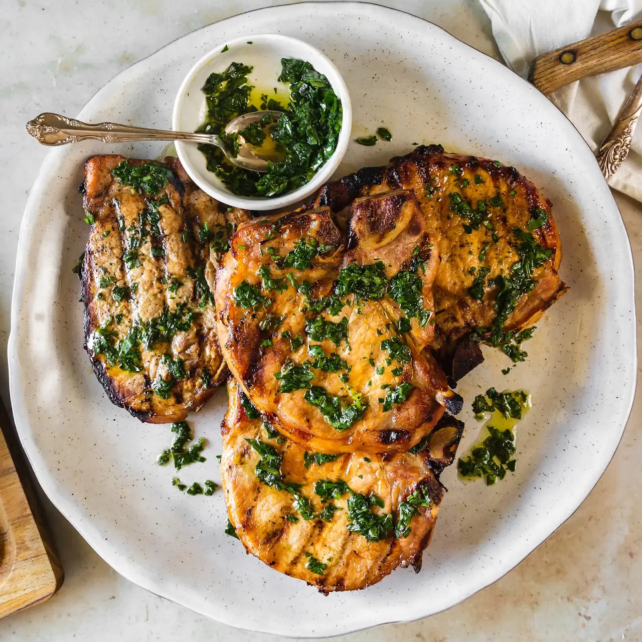 Grilled Orange and Smoked Paprika Brined Pork Chops with Basil Chimichurri cover