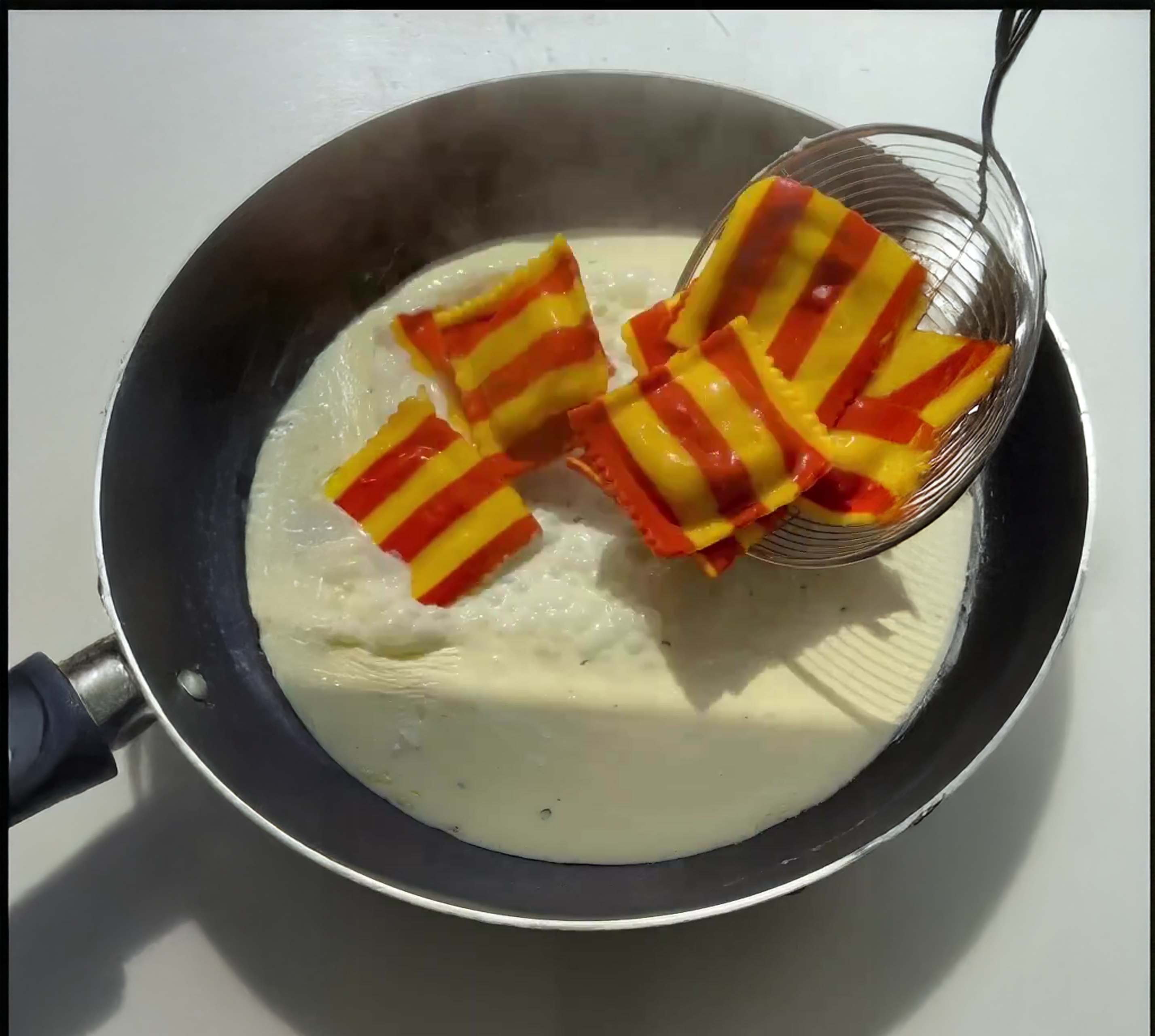 Lobster Ravioli in Alfredo Sauce