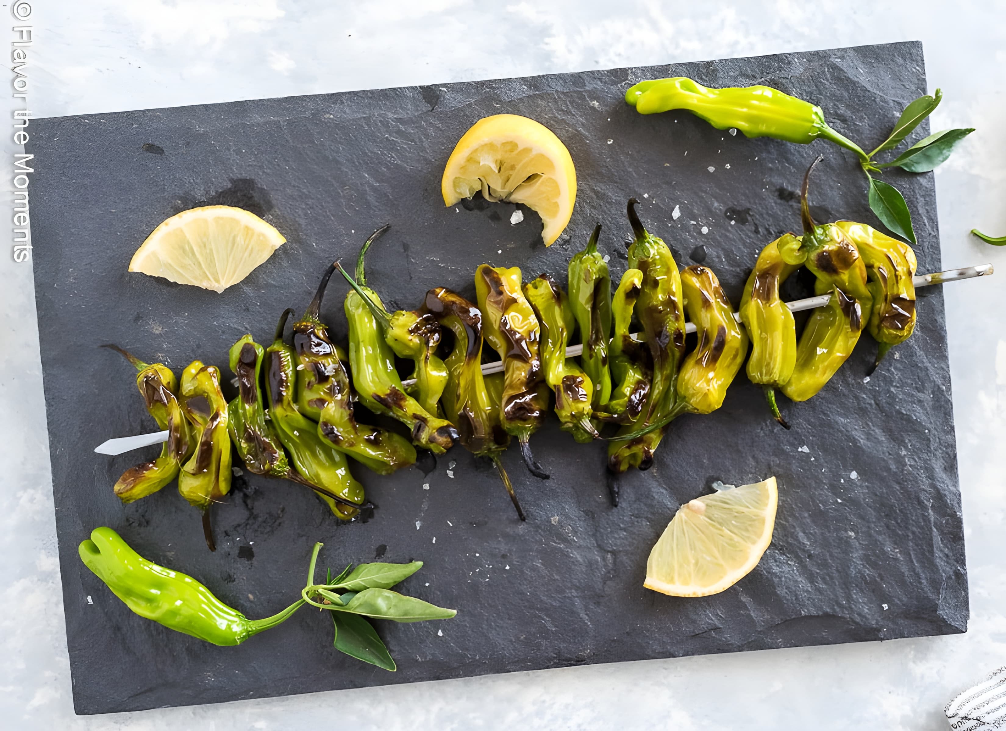 Grilled Shishito Peppers with Lemon and Sea Salt