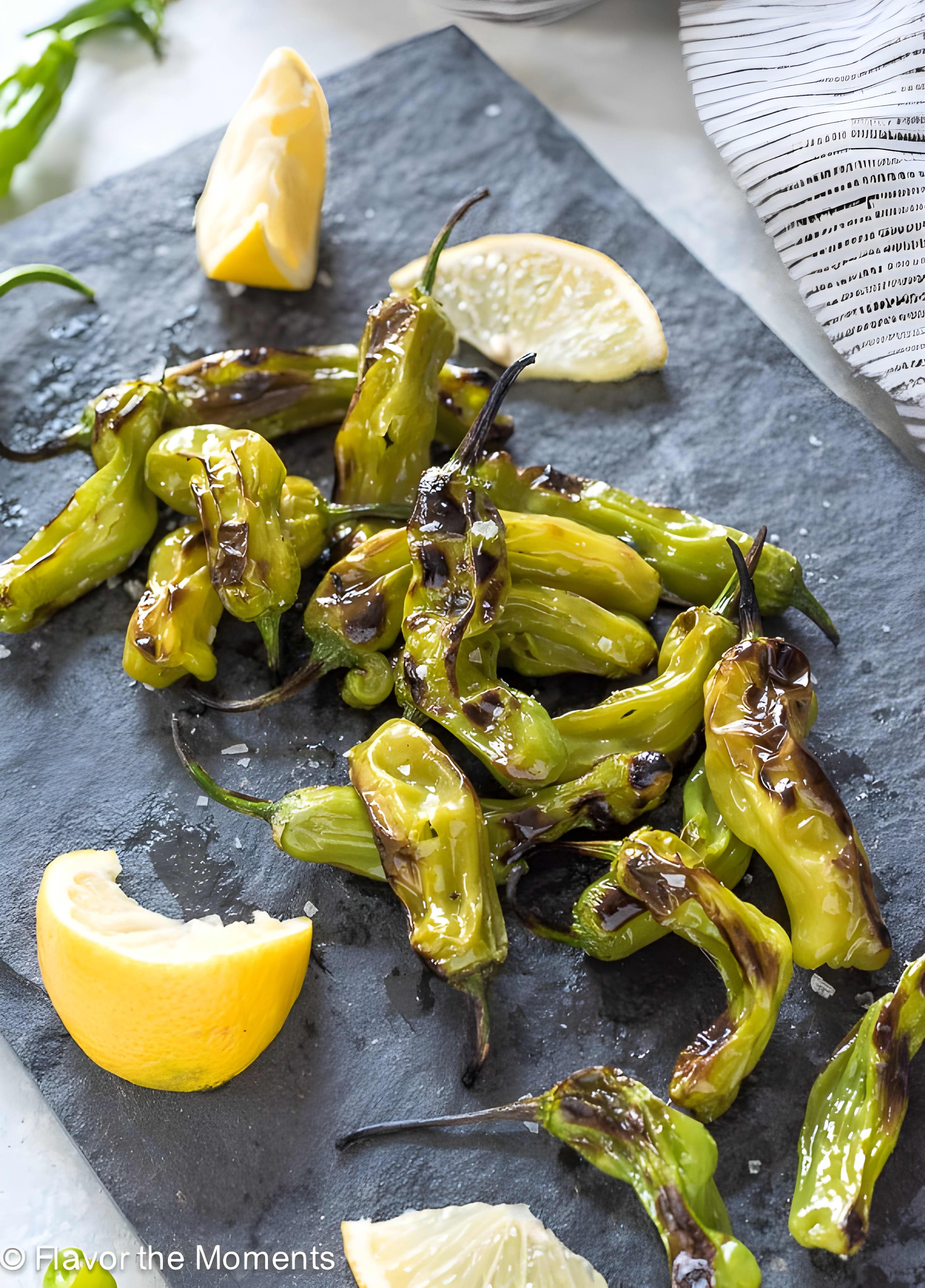 Grilled Shishito Peppers with Lemon and Sea Salt