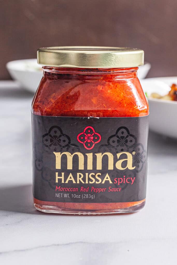 Harissa Roasted Cauliflower and Chickpeas with Tahini Sauce 