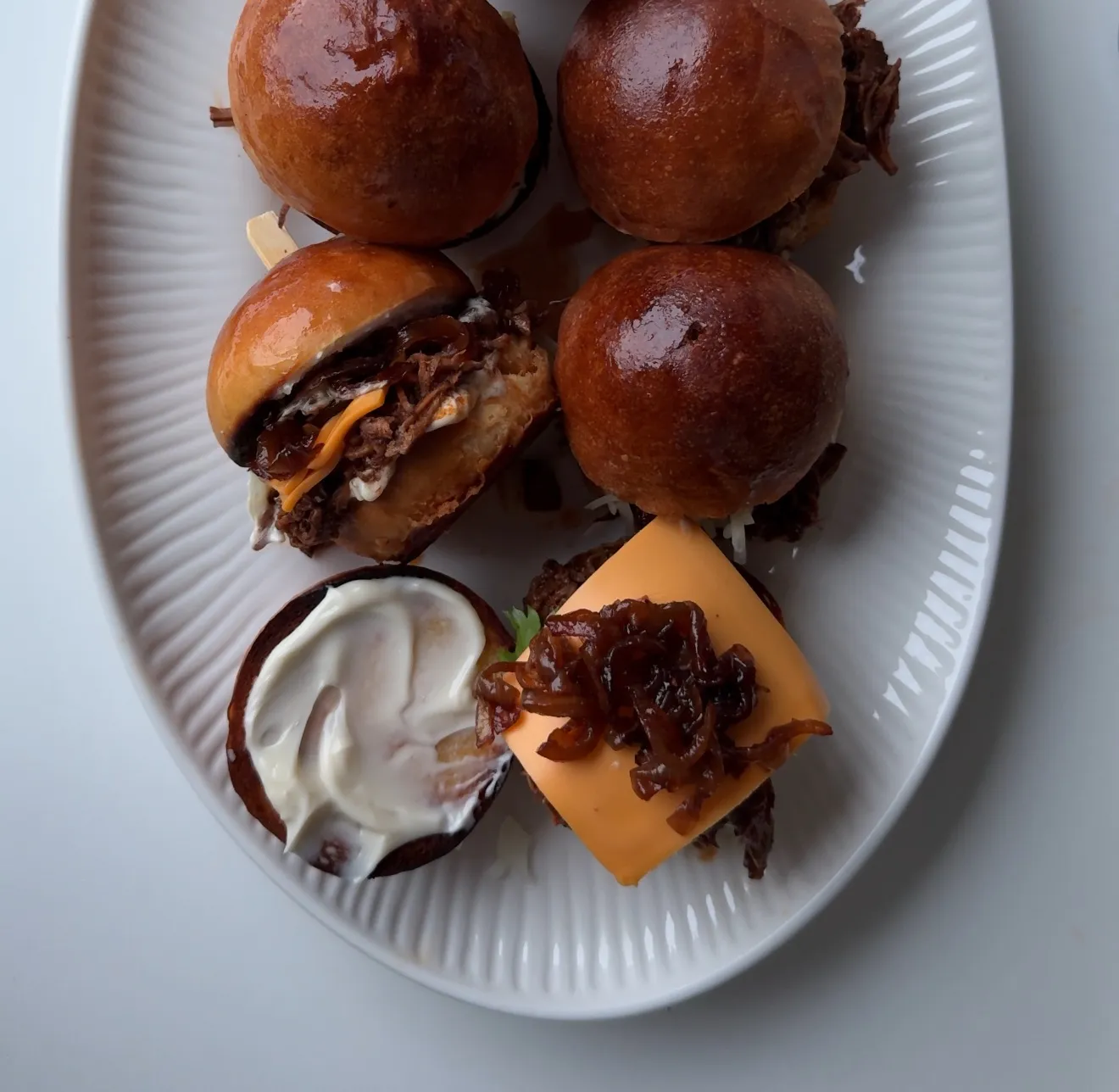 Birria Sliders with Caramelized Onions