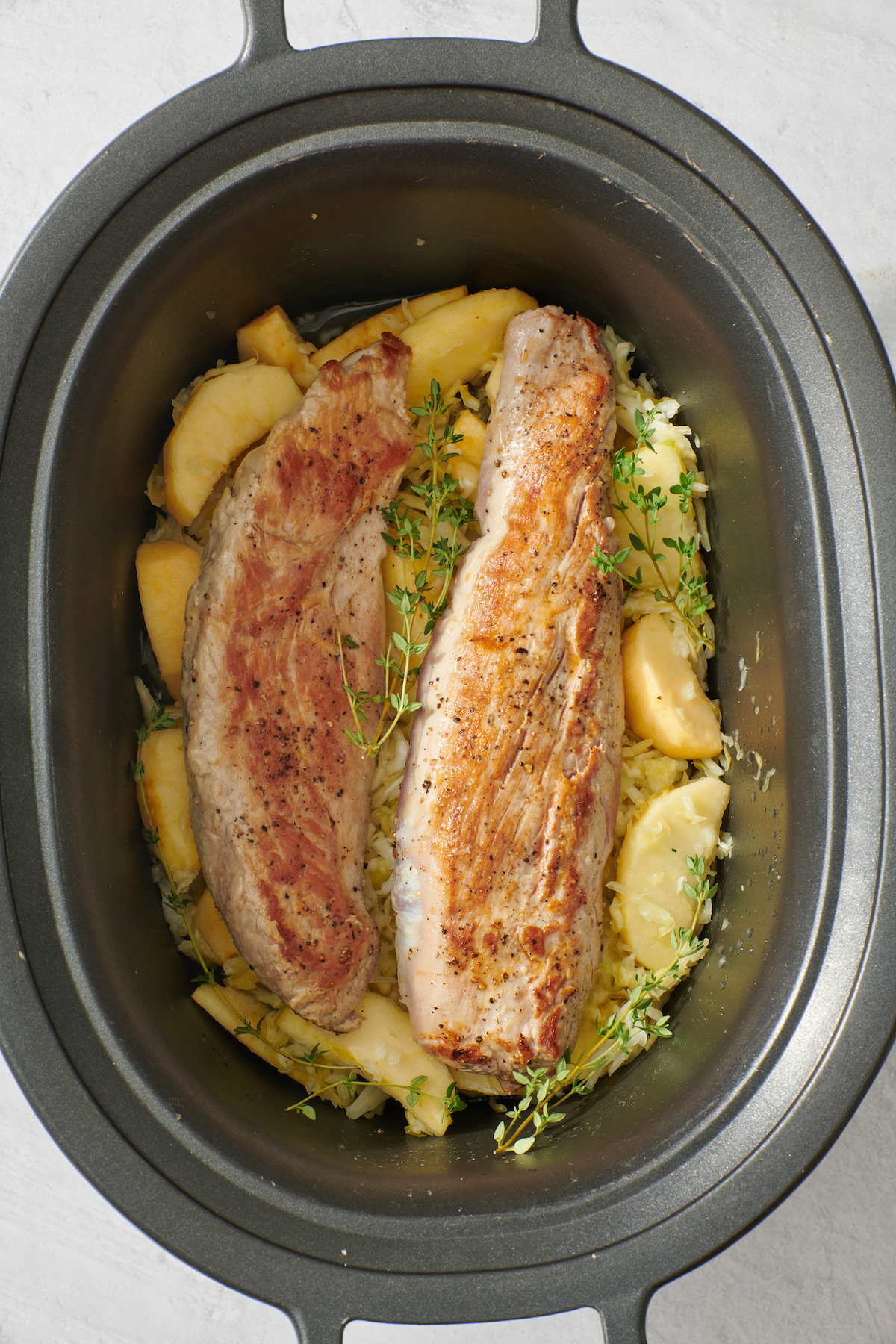 Slow Cooker Pork Tenderloin with Apples and Sauerkraut