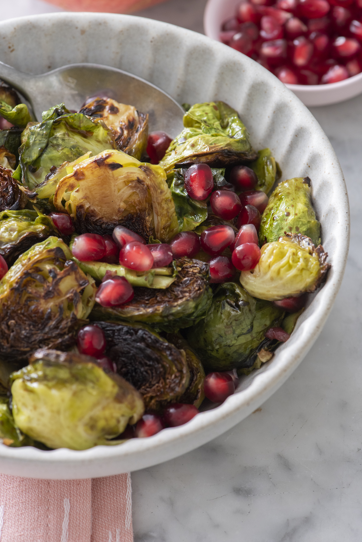 Cast Iron Brussels Sprouts with Pomegranate and Garlic