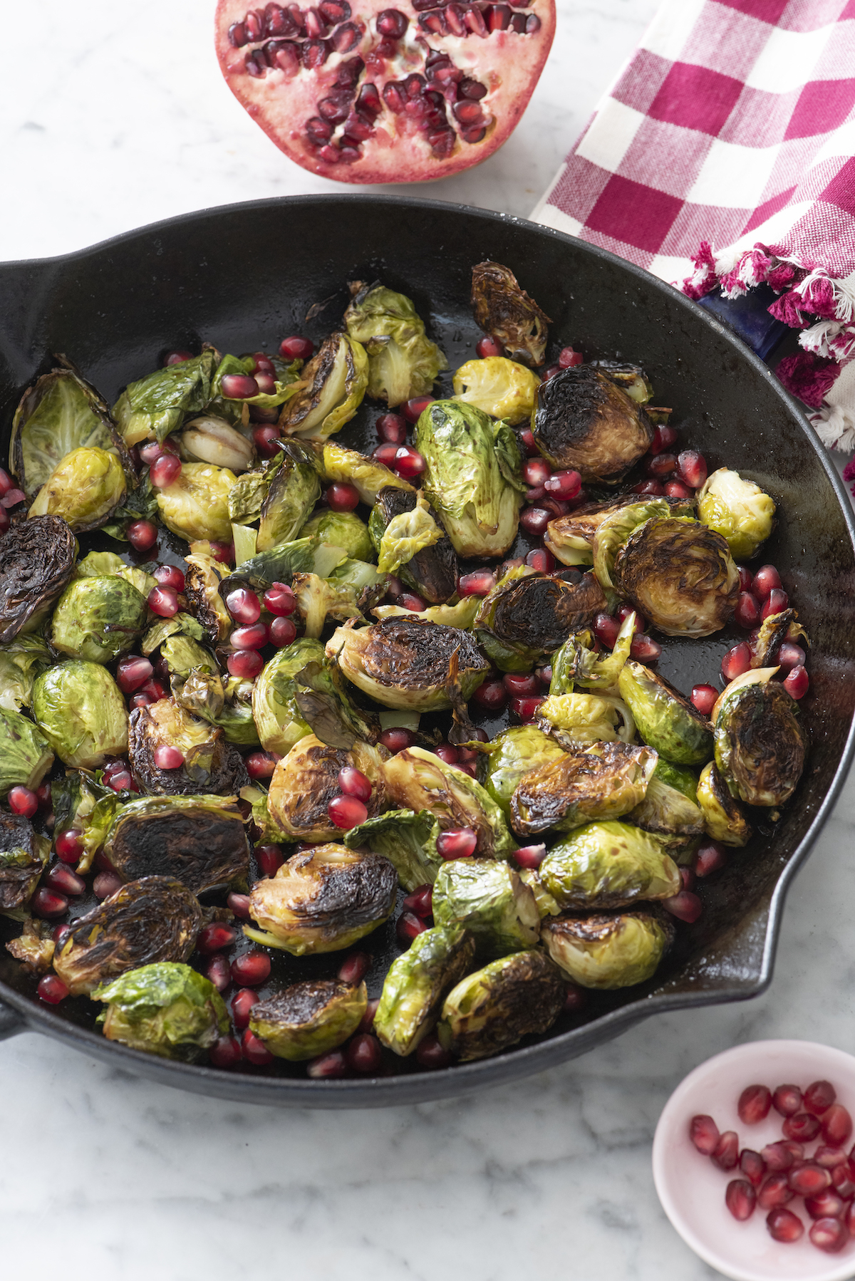 Cast Iron Brussels Sprouts with Pomegranate and Garlic