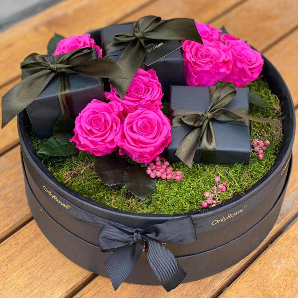 Gift wrapped in soho purple roses Gift wrapped in soho purple roses