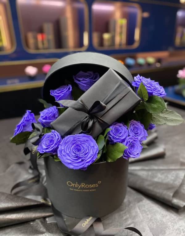 Gift wrapped in waldorf purple roses Gift wrapped in waldorf purple roses