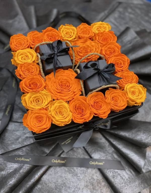 Gift wrapped in plaza orange roses Gift wrapped in plaza orange roses