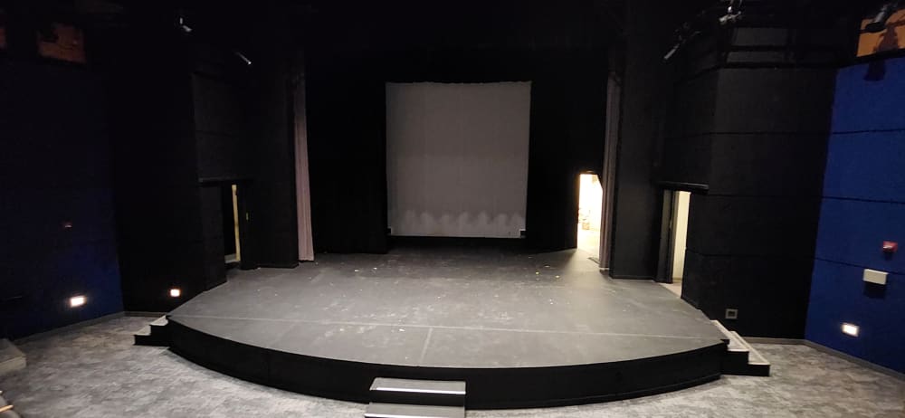 A photo of the stage of the Millennium Theatre