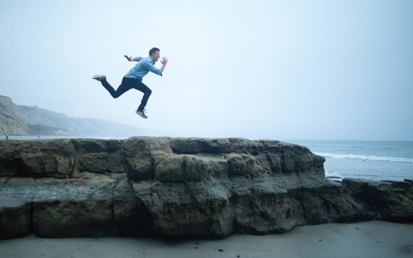 A man running straight off a cliff.