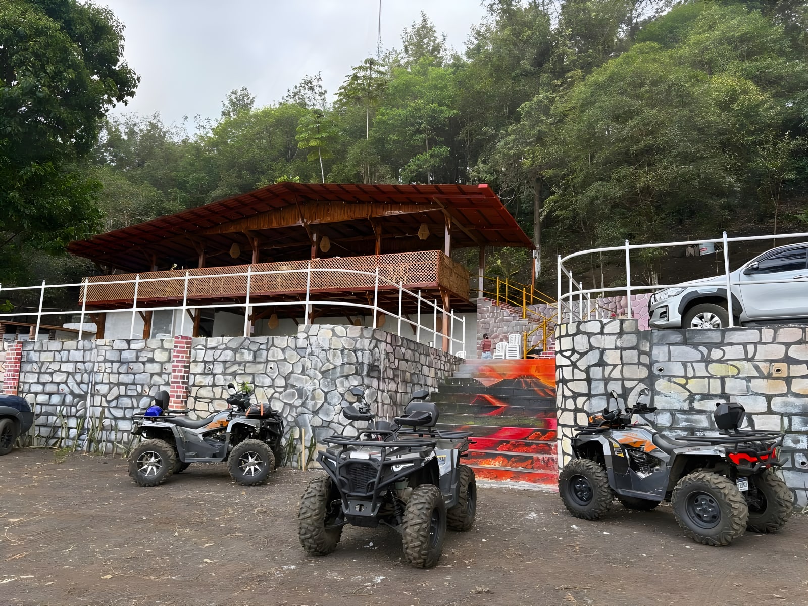 Tour base with parked ATVs