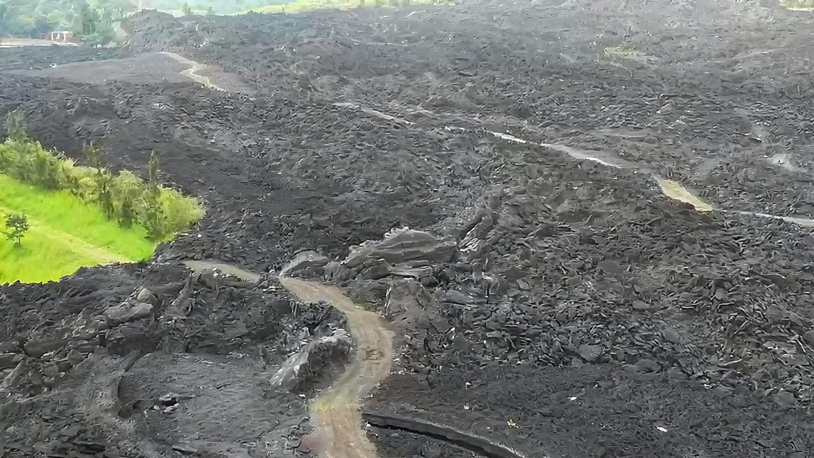 Drone view of a trail winding through hardened lava