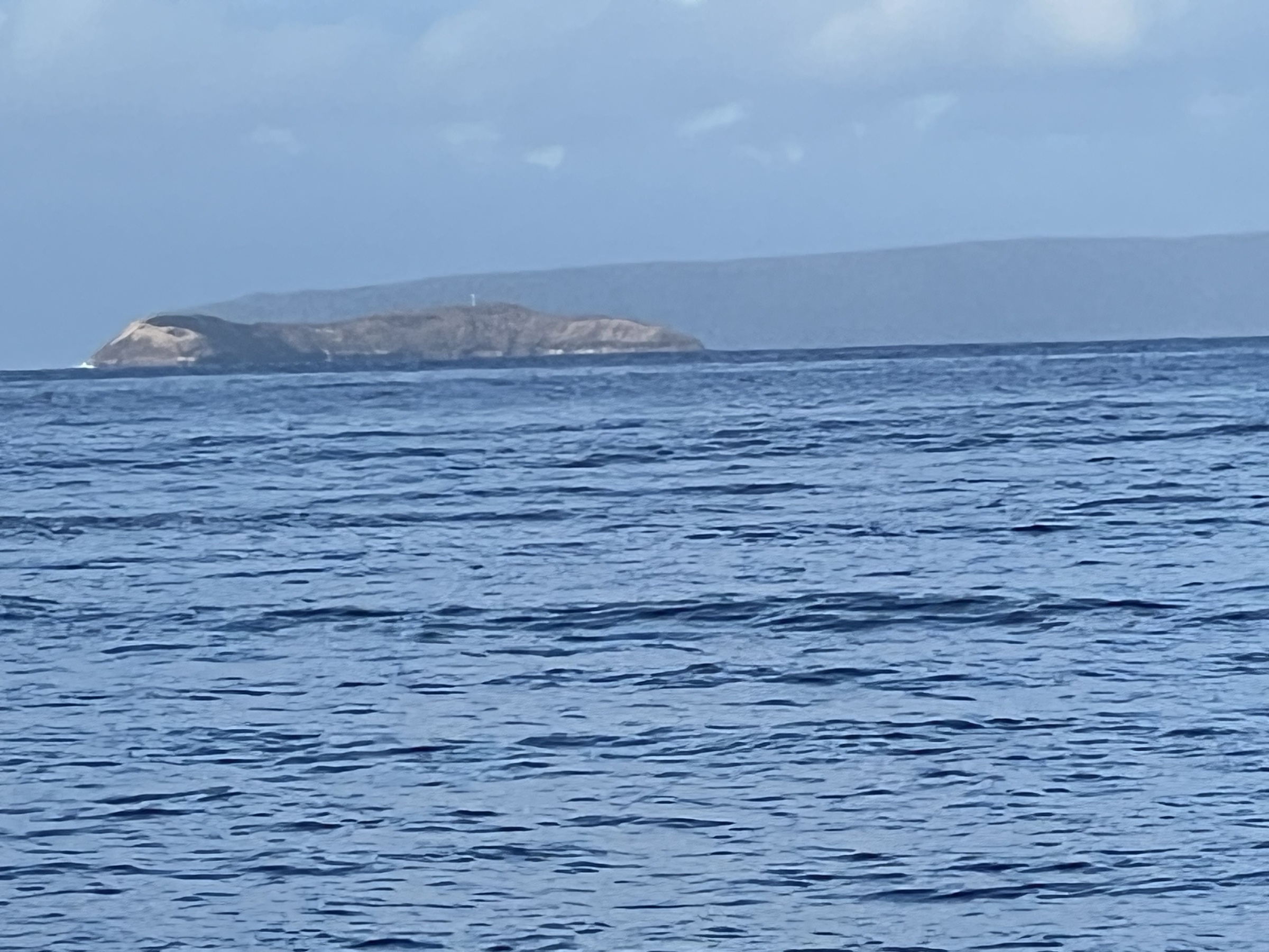 Molokini and Kaho'olawe on the horizon — early morning ocean view from the South Kihei beach walk