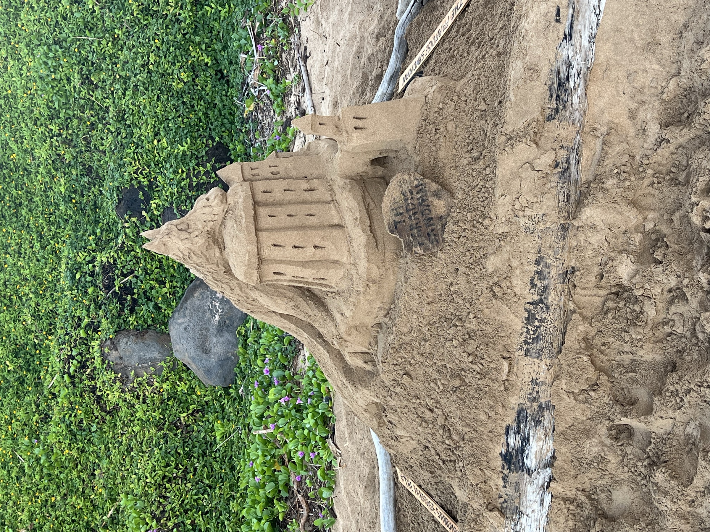 Paradise Sandman dragon castle — first sight approaching on Kama'ole II beach, June 29, 2026