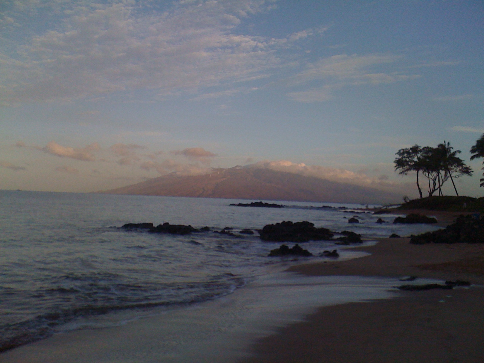 Keawakapu Beach at dawn, South Kihei — lava rocks and West Maui mountains