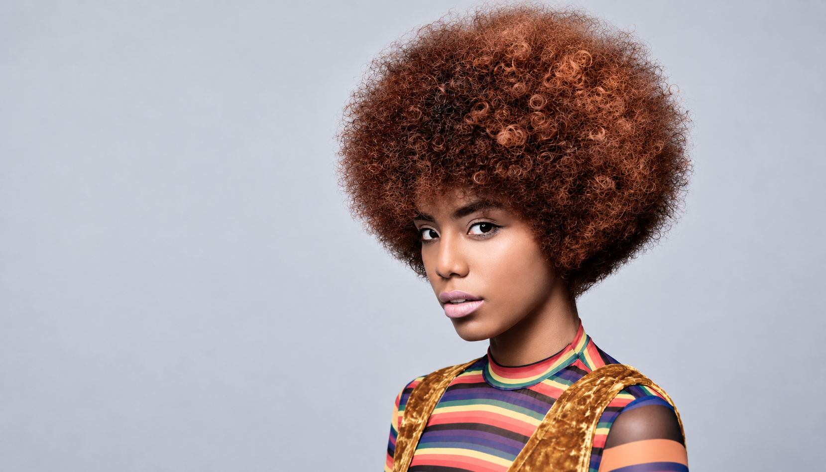 Creative women's haircut demonstrating professional layering, texture and precision hair cutting.
