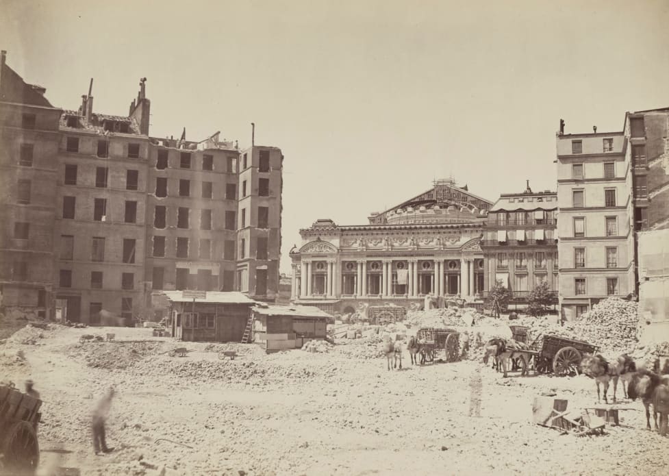 Construction site of the Palais Garnier. View of the area around the Place de l'Opéra with piles of rubble.