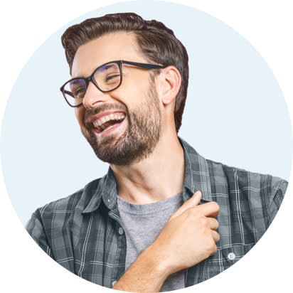Image of Oportun customer smiling when he was approved for a loan