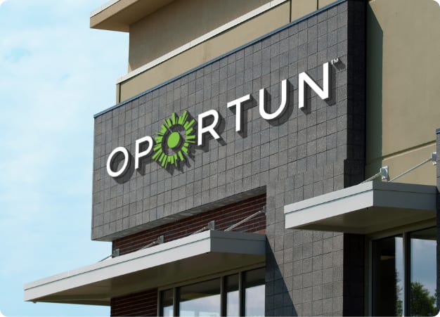 Photo of an Oportun loan company signage on the building facade