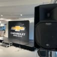 A Chevrolet speaker is on display in a showroom.