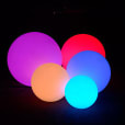 A group of colorful Glow Spheres, measuring 60cm each, illuminating the darkness.