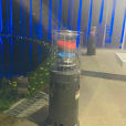 Pkg 3 - A gas heater in front of a pool at night.