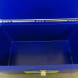 A blue plastic box, available for Esky Hire, with a lid on it.