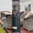 Pkg 1 - A gas heater sitting on a deck.