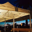 Sydney harbour bridge and sydney opera house at dusk covered by a 4mx8m Pop Up Marquee with a White Roof.