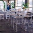 A white table and chairs in a room.