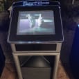 A video game machine with a tv screen on it, perfect for Jukebox Hire Only.