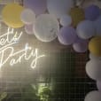 Neon Sign Hire for an Epic Let's Party with Balloon Arch