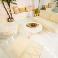 Our white round coffee table on display