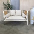 Our white rattan sofa lounge on display