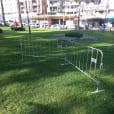 Our crowd control barriers on the grass in a park