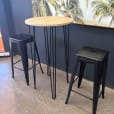 Our black hairpin round cocktail table with some tolix tools