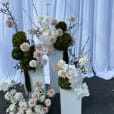 Our large white plinths being used for flower decorations
