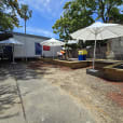 Our market umbrellas being used in an outdoor stall area