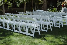 White Gladiator Chairs For Wedding Ceremony