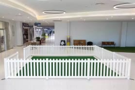 White Picket Fence In Shopping Centre