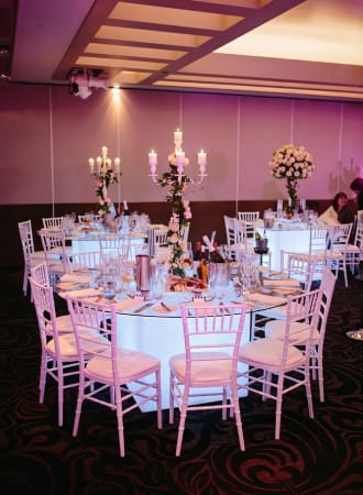 White Tiffany Chairs Hire with Glowing Tables