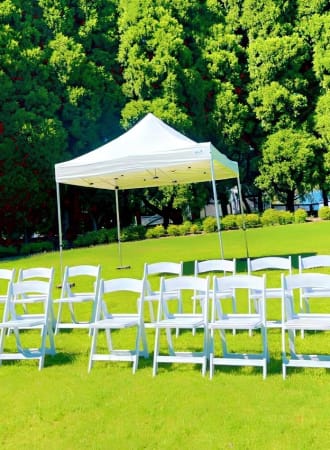 White Gladiator Chairs with Marquee