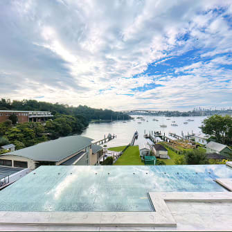A new glass roof awning on a Sydney business overlooking a river