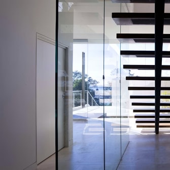 Beautiful glass walls inside of a residential property