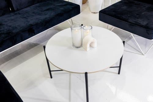 Black cross coffee table with white top