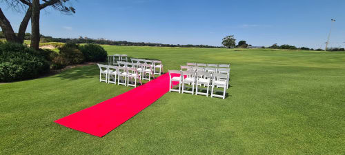 White Padded Folding Chairs & Red Carpet Hire