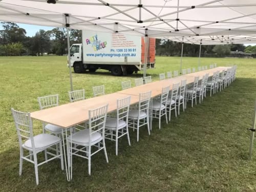 Party Hire Group setting up Tiffany chairs